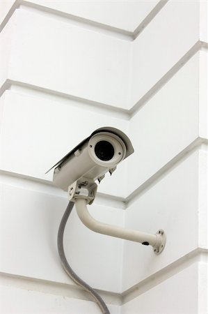 A CCTV Camera on the white wall. Stock Photo - Budget Royalty-Free & Subscription, Code: 400-05360405