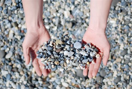 simsearch:400-04114367,k - Abstract and Objects. Many small stones in hands Stock Photo - Budget Royalty-Free & Subscription, Code: 400-05362217