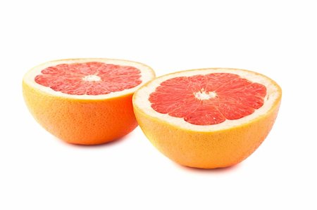 simsearch:400-06513460,k - Grapefruit halves isolated on the white background Stock Photo - Budget Royalty-Free & Subscription, Code: 400-05363868