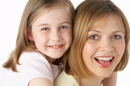 Mother And Daughter Smiling Stock Photo - Budget Royalty-Free & Subscription, Code: 400-05374243