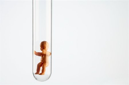 Baby Figurine In A Test Tube Stock Photo - Budget Royalty-Free & Subscription, Code: 400-05374572