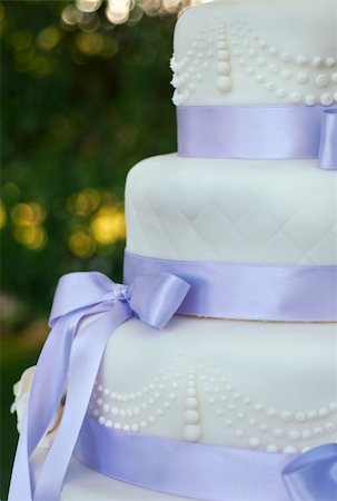 details on a wedding cake with violet ribbons and decorations Stock Photo - Budget Royalty-Free & Subscription, Code: 400-05377685