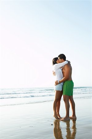 simsearch:6109-06195487,k - portrait of an adorable  couple in love kissing and embracing each other on the edge of the beach adorable  couple in love kissing and embracing each other on the edge of the beach Stock Photo - Budget Royalty-Free & Subscription, Code: 400-05379098