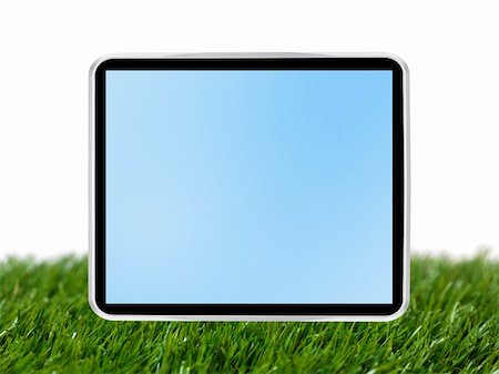 simsearch:400-04125018,k - A computer tablet isolated against a grass background Stock Photo - Budget Royalty-Free & Subscription, Code: 400-05379171