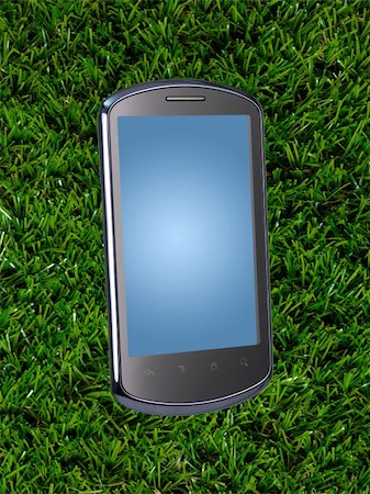 simsearch:400-04125018,k - A mobile phone isolated against a green grass Stock Photo - Budget Royalty-Free & Subscription, Code: 400-05379172