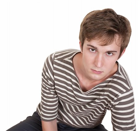 simsearch:400-05388090,k - Bored young Caucasian man over white background Stock Photo - Budget Royalty-Free & Subscription, Code: 400-05379693