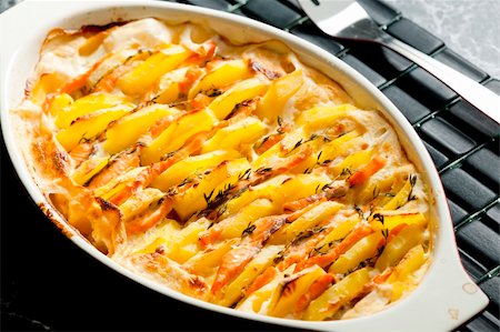 potatoes and salmon baked in cream Stock Photo - Budget Royalty-Free & Subscription, Code: 400-05379788