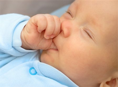 simsearch:400-05153083,k - Baby boy sucking thumb to fall asleep Stock Photo - Budget Royalty-Free & Subscription, Code: 400-05370268