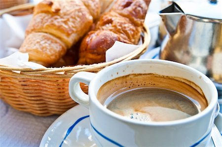 simsearch:400-05704519,k - Breakfast with coffee and croissants in a basket on table Stock Photo - Budget Royalty-Free & Subscription, Code: 400-05371256