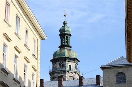 statues on building top - Lvov. Ukraine. Dome with a cross Stock Photo - Budget Royalty-Free & Subscription, Code: 400-05371506