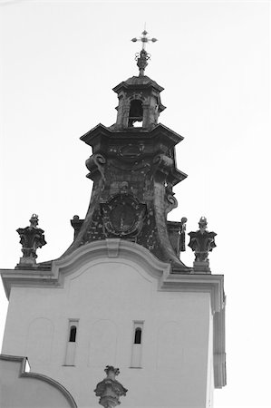 statues on building top - Lvov. Ukraine. Dome with a cross Stock Photo - Budget Royalty-Free & Subscription, Code: 400-05371507