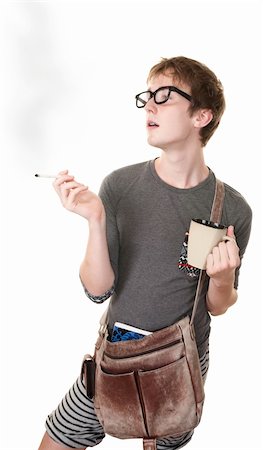 Teen with messenger bag and mug smokes a cigarette Foto de stock - Super Valor sin royalties y Suscripción, Código: 400-05372649