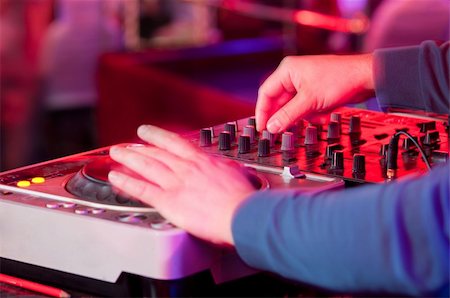 simsearch:400-04630784,k - Dj playing the track in the nightclub at a party Stock Photo - Budget Royalty-Free & Subscription, Code: 400-05373248