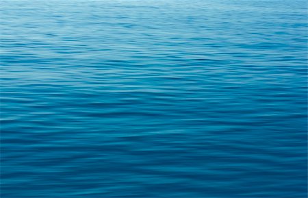 simsearch:400-05159516,k - Small waves on water surface in motion blur. Stock Photo - Budget Royalty-Free & Subscription, Code: 400-05384794