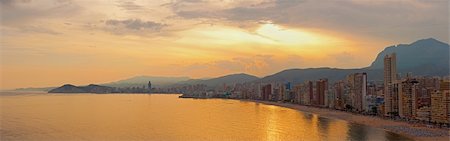 simsearch:400-05896461,k - Benidorm bay at Costa Blanca sunset panorama. View from the end of the bay. Stock Photo - Budget Royalty-Free & Subscription, Code: 400-05384792