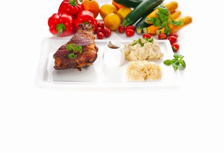 simsearch:400-04684204,k - original German BBQ pork  knuckle served with mashed potatoes and  sauerkraut ,fresh vegetables on background, Photographie de stock - Aubaine LD & Abonnement, Code: 400-05384897