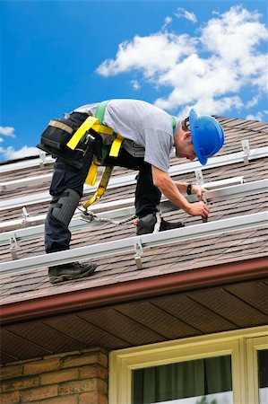 solar panel home - Man installing rails for solar panels on residential house roof Stock Photo - Budget Royalty-Free & Subscription, Code: 400-05386122