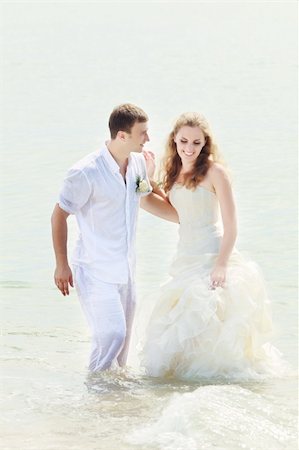 simsearch:400-05328142,k - Bride and groom in the sea. Tropical wedding Stock Photo - Budget Royalty-Free & Subscription, Code: 400-05386300