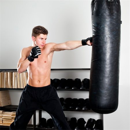 simsearch:400-05908874,k - An image of a boxing man in the studio Stock Photo - Budget Royalty-Free & Subscription, Code: 400-05386627