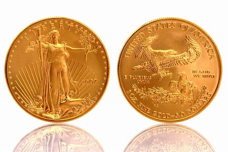 The American Gold Eagle Coin is an official gold bullion coin of the United States it is minted in 22 karat gold. Stock Photo - Budget Royalty-Free & Subscription, Code: 400-05388183