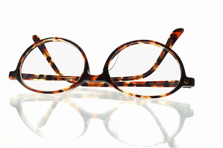 simsearch:400-07774329,k - Old fashion plastic frame eyeglasses on white background Stock Photo - Budget Royalty-Free & Subscription, Code: 400-05388483