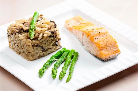 baked salmon with mushroom risotto and green asparagus Stock Photo - Budget Royalty-Free & Subscription, Code: 400-05380028