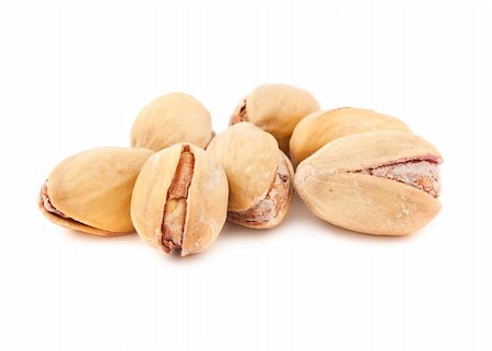 simsearch:400-04833195,k - Toasted pistachios isolated on a white background Stock Photo - Budget Royalty-Free & Subscription, Code: 400-05380613