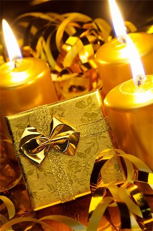 simsearch:400-04499144,k - Christmas candles and gift boxes. Gold color Stock Photo - Budget Royalty-Free & Subscription, Code: 400-05380759
