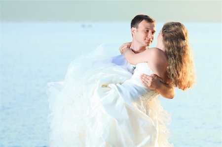 simsearch:400-05328142,k - Bride and groom on the beach. Tropical wedding Stock Photo - Budget Royalty-Free & Subscription, Code: 400-05381690