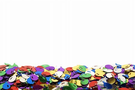 A pile of balloon confetti at the bottom of the frame on a white background. Stock Photo - Budget Royalty-Free & Subscription, Code: 400-05381936