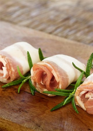 simsearch:400-04885499,k - Slices of rolled bacon with rosemary Stock Photo - Budget Royalty-Free & Subscription, Code: 400-05382454