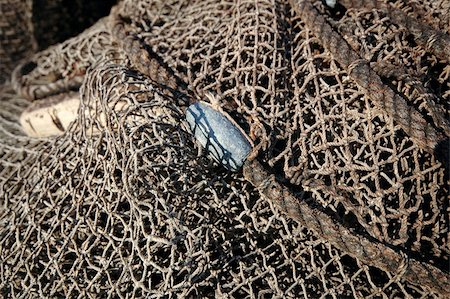 simsearch:400-05254289,k - Fishing net is drying in the sun. Stock Photo - Budget Royalty-Free & Subscription, Code: 400-05383049