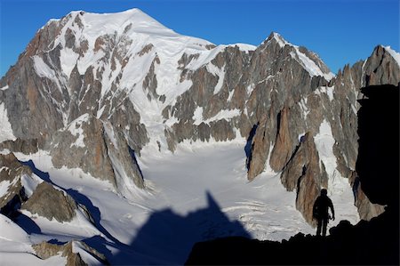 Highest mountain in Europe, Mt. Blanc at sunrise  with climbers silhouette in the foreground Stock Photo - Budget Royalty-Free & Subscription, Code: 400-05383337