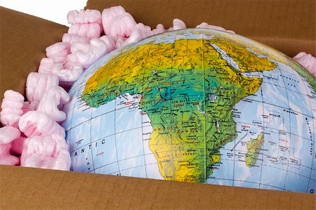 simsearch:400-06737278,k - Close-up of a globe in a delivery box. Stock Photo - Budget Royalty-Free & Subscription, Code: 400-05383988