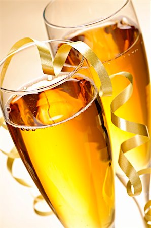 Two full champagne flutes with sparkling wine and ribbon Stock Photo - Budget Royalty-Free & Subscription, Code: 400-05669570