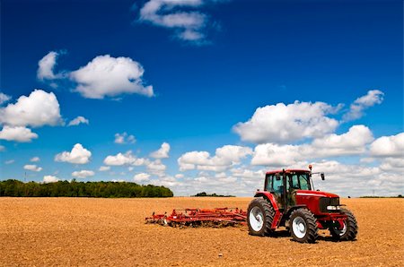 simsearch:400-05297250,k - Small scale farming with tractor and plow in field Stock Photo - Budget Royalty-Free & Subscription, Code: 400-05669635