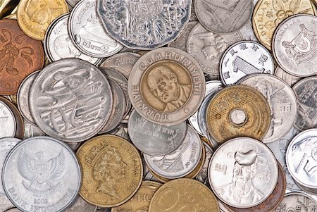 simsearch:400-05388219,k - Coins currency from multiple countries, taken from top in isolated background view can be use for financial purposes Stock Photo - Budget Royalty-Free & Subscription, Code: 400-05669658