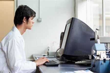 Student working with a monitor in a laboratory Stock Photo - Budget Royalty-Free & Subscription, Code: 400-05669799