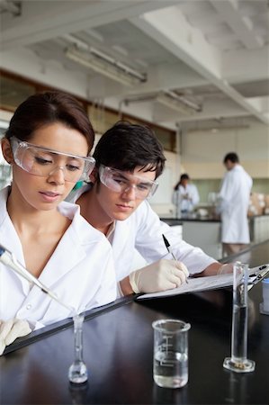 Portrait of young science students working in a laboratory Stock Photo - Budget Royalty-Free & Subscription, Code: 400-05669945