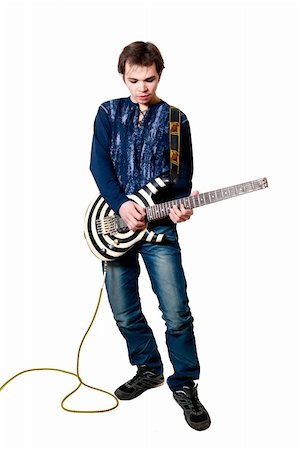 picture of the blue playing a instruments - Young guitarist with electric guitar on white background Stock Photo - Budget Royalty-Free & Subscription, Code: 400-05663331