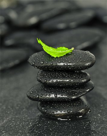 spa water background pictures - Black spa pebbles with rain drops on dark background Stock Photo - Budget Royalty-Free & Subscription, Code: 400-05663456