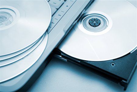 disk drive - Close up image of computer and cd and dvd Stock Photo - Budget Royalty-Free & Subscription, Code: 400-05663899