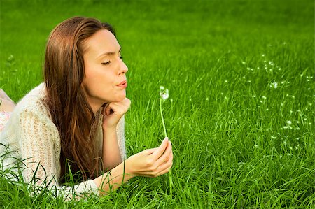 simsearch:400-04399510,k - Girl with dandelion on the green field Stock Photo - Budget Royalty-Free & Subscription, Code: 400-05663978