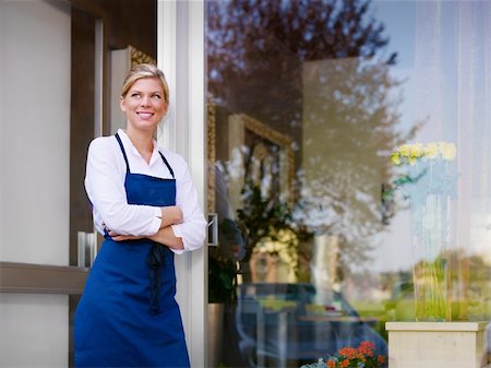 self-employed (female) - Portrait of beautiful caucasian girl self-employed in flower shop, smiling and looking away. Horizontal shape, waist up, copy space Stock Photo - Budget Royalty-Free & Subscription, Code: 400-05674611