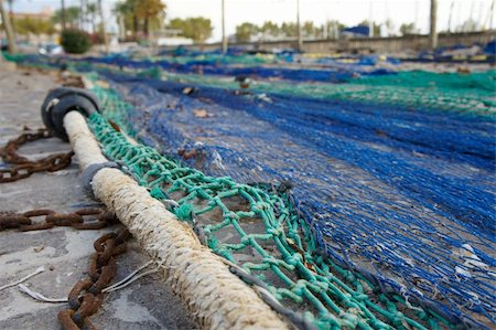 photograph of drying fishing nets Foto de stock - Super Valor sin royalties y Suscripción, Código: 400-05675714