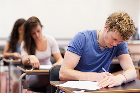 simsearch:400-05677768,k - Students having a test in a classroom Stock Photo - Budget Royalty-Free & Subscription, Code: 400-05677739