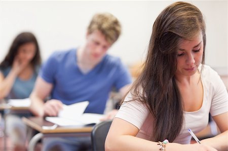 simsearch:400-05677768,k - Good looking students having a test in a classroom Stock Photo - Budget Royalty-Free & Subscription, Code: 400-05677750