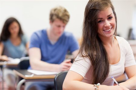 simsearch:400-05677768,k - Attractive students having a test in a classroom Stock Photo - Budget Royalty-Free & Subscription, Code: 400-05677751