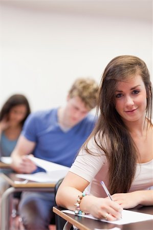 simsearch:400-05677768,k - Portrait of students doing an assignment in a classroom Stock Photo - Budget Royalty-Free & Subscription, Code: 400-05677753