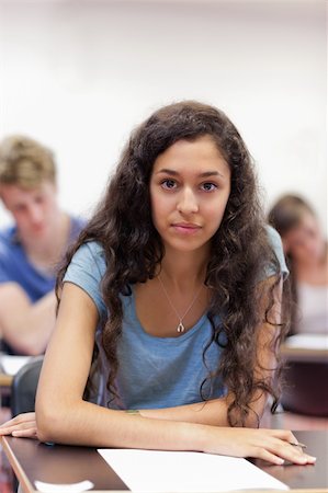 simsearch:400-05677768,k - Portrait of serious students working on an assignment in a classroom Stock Photo - Budget Royalty-Free & Subscription, Code: 400-05677763